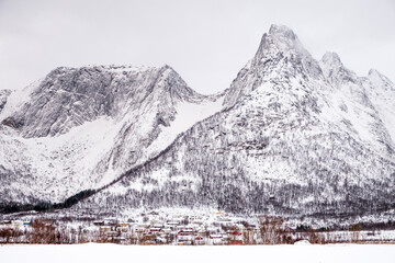 Snow covered mountains in winter in the Arctic Circle