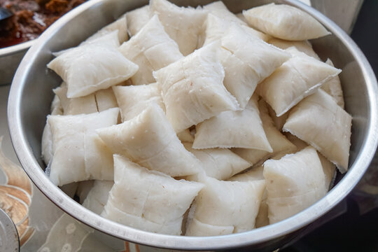 &ldquo;Nasi Impit Segera" are instant compressed rice cakes, served on a tray, ideal for quick preparation of traditional Malaysian dishes.