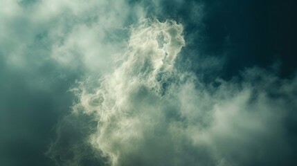 Obraz premium An abstract, ethereal cloud formation glowing against a deep blue sky, invoking mystery and beauty in nature.