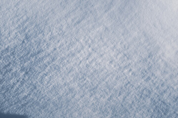 Smooth snow background, top view. Snow texture for publication, poster, screensaver, wallpaper,...