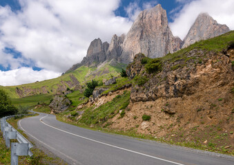 Highway on the background of large rocks. View of the Caucasus Mountains in Ingushetia, Russia