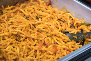 Pasta with sauce and vegetables, spaghetti. Traditional dish of Italian cuisine