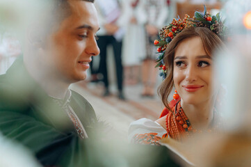 the bride and groom say their vows during the wedding ceremony. the bride is crying, tears. Wedding...
