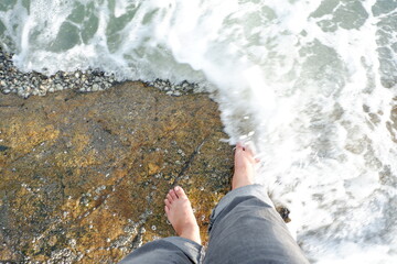 feet on the rocks,feet on the beach,feet in water,Relaxing on the beach, Relaxing at the seaside