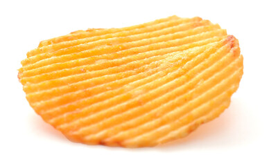 Ridged potato chips isolated on white background