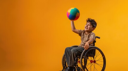 Joyful Wheelchair Bound Boy Playing Ball