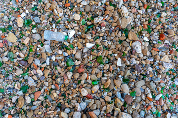 Microplastics on Sand Beach. Micro Plastics Garbage, Tiny Trash Pieces, Microplastic Waste, Dirty Shore