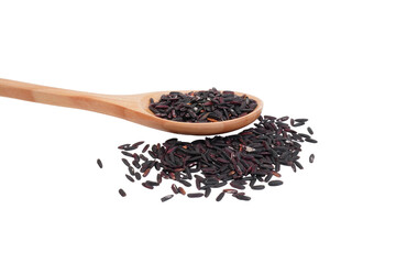 a spoon of black rice grains with some scattered over isolated transparent
