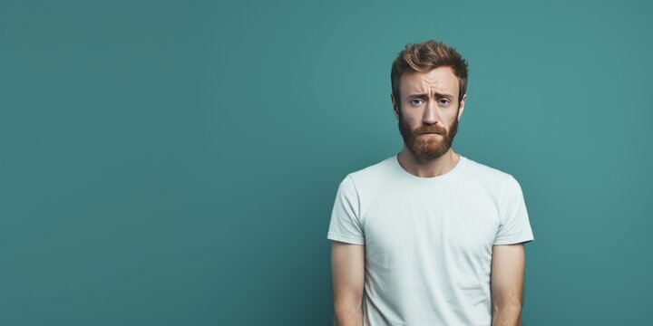 Mint Background Sad European White Man Realistic Person Portrait Of Young Beautiful Bad Mood Expression Man Isolated On Background Depression Anxiety 