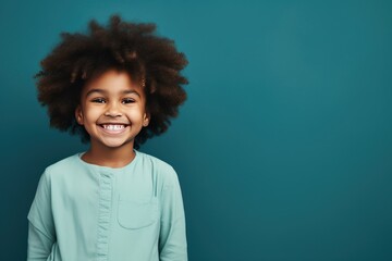 Navy background Happy black american african child Portrait of young beautiful kid Isolated on Background ethnic diversity equality acceptance concept