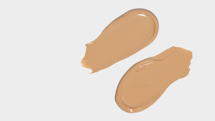 Makeup foundation, beige concealer swatch smudge smear on white background. BB CC cream texture