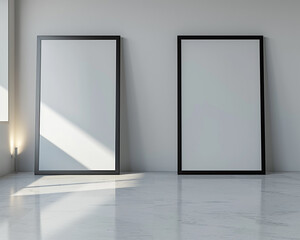 Two empty white frames with dark borders in a sleek, modern architectural design studio, 