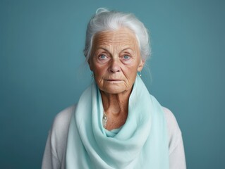 Teal background sad European white Woman grandmother realistic person portrait of young beautiful...