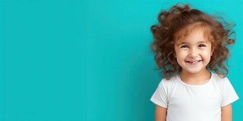 Turquoise background Happy european white child realistic person portrait of young beautiful Smiling child Isolated on Background Banner with copyspace blank empty 