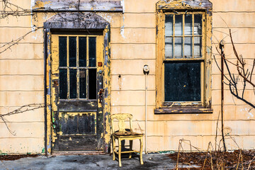 Vintage door with window on abandoned structure in rural Virginia.