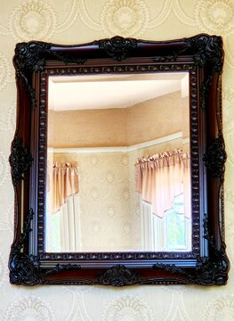 frame on the wall with a mirror