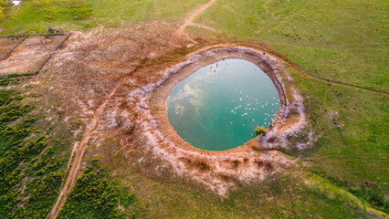 Aerial view of a circular water body in Hato La Aurora, Casanare, Colombia