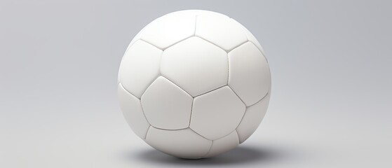 Obraz premium Minimalist white soccer ball on a plain background showcasing simplicity and elegance in design, perfect for sports-related content.