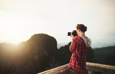 Man, photographer and camera for hiking, mountains and nature with shooting for job at eco...