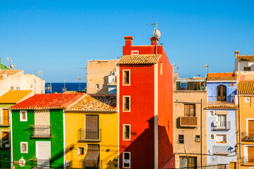 Panoramic view to beautiful Villajoyosa multi-colored houses and Mediterranean Sea. La Vila Joiosa...
