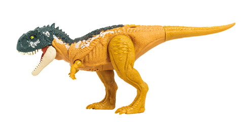Tyrannosaurus Rex dinosaur plastic toy isolated on PNG transparent background.