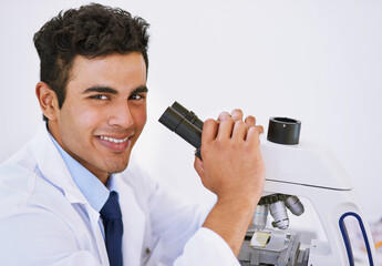 Portrait, technician and microscope in laboratory for studying, research and innovation or...