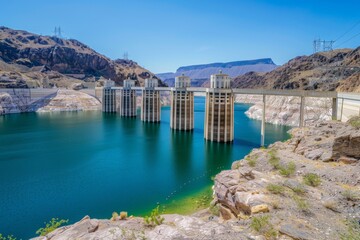 Large Hydroelectric Dam with Reservoir in Desert Landscape