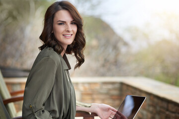 Woman, portrait and smile outside with laptop for travel journal with pride for social media job on...