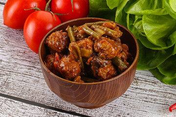 Meatball with vegetables and spices