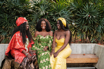 Group of women with typical African costumes at an outdoor party. Concept: Friendship