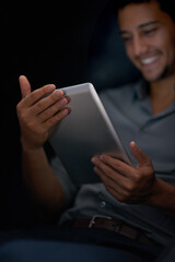 Happy man, tablet and night with smile for meme, social media app or comic video on web, internet or blog. Young businessman, smile and digital touchscreen for reading in dark with funny chat