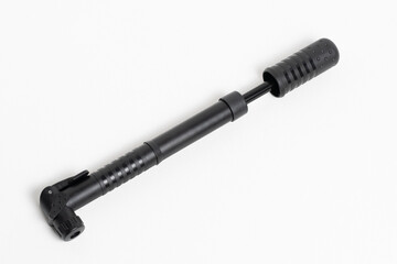Bike pump closeup white background, view from above.