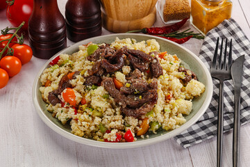 Traditional couscous with beef and vegetables