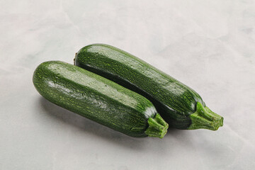 Raw green ripe zucchini vegetable