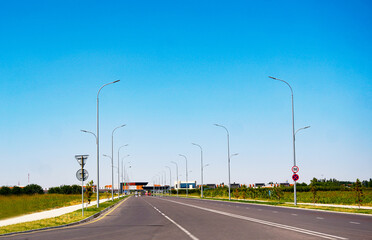 lights on poles by the side of the road