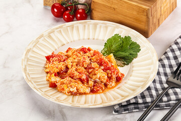 Shakshuka with tomato for breakfast