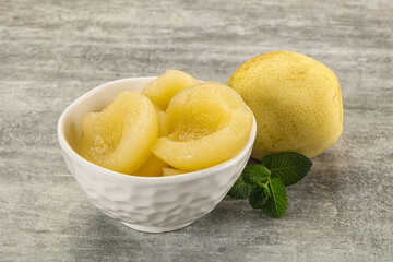 Canned yellow pear with syrup