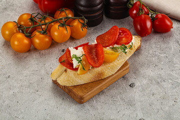 Bruschetta tapas with chorizo and tomato