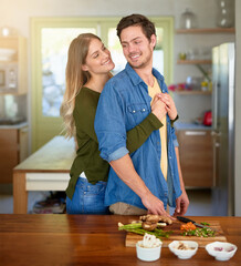 Happy, couple and cooking with hug in kitchen for healthy food, meal preparation and nutrition at...