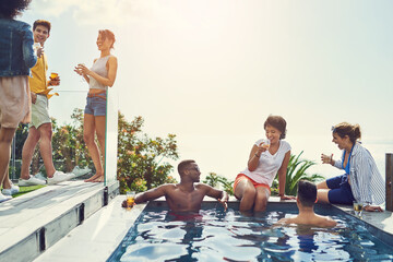Friends, drinks and party in swimming pool with space for mock up with blue sky in summer with...