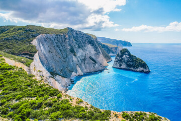 Plakaki beach on Zakynthos island or Zante Island, Greece. Beautiful views of azure sea water and nature with cliffs cave