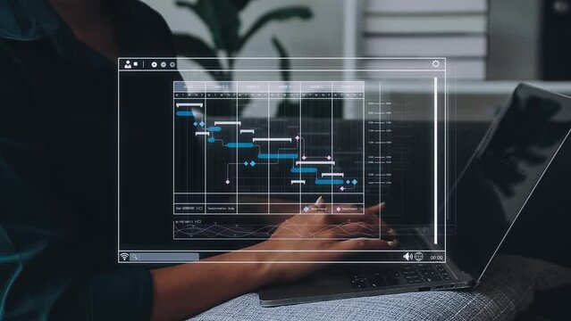 Project manager working with Gantt chart schedule to plan tasks and deliverables. Scheduling activities with a planning software, Corporate strategy for finance, operations, sales, marketing.