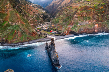 Aerial view of Ribeira da Janela beach with rock Ilheu Grande ,  Madeira Island, Portugal