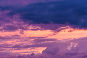 The sky is decorated with purple and pink clouds during a beautiful sunset