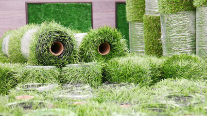 Many green artificial turf rolls on the market
