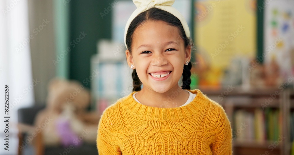 Sticker Smile, face and girl in classroom for education, learning and ready for morning kindergarten. Happy, school and portrait of child or student with knowledge, studying and pride for academic lesson