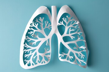 Paper model of human lungs on light blue background. Respiratory health, health diagnostic concept. World no tobacco day.