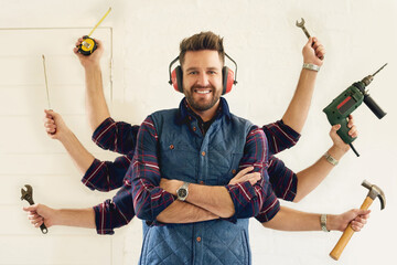Handyman, tools and multitask in workshop for portrait, busy and DIY or small business. Male...