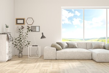 Fototapeta premium White living room with sofa and summer landscape in window. Scandinavian interior design. 3D illustration