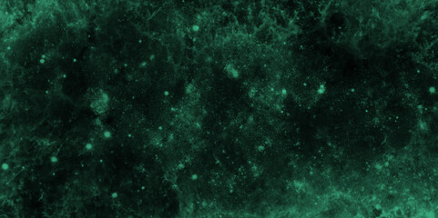 Green dust overlay particle abstract grunge texture on dark background. Abstract distressed vintage grunge. Jade color black particle explosion on dark background. Abstract design with fog on black	